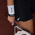 Gabriq black performance socks worn on court with breathable fabric and supportive fit for padel