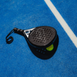 Elvone Hybrid Pro padel racket placed on the court, showcasing its sleek design and superior performance.